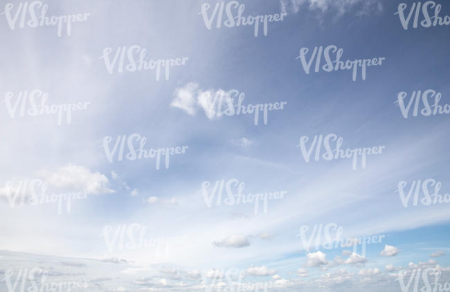 daytime sky covered with thin clouds