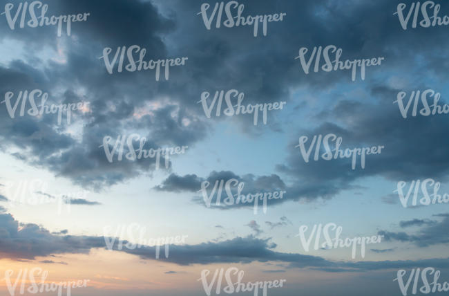 sunrise with dark blue clouds