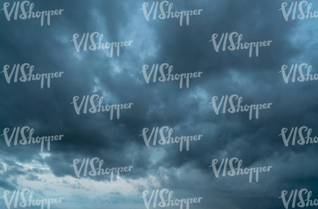 overcast sky with deep blue clouds