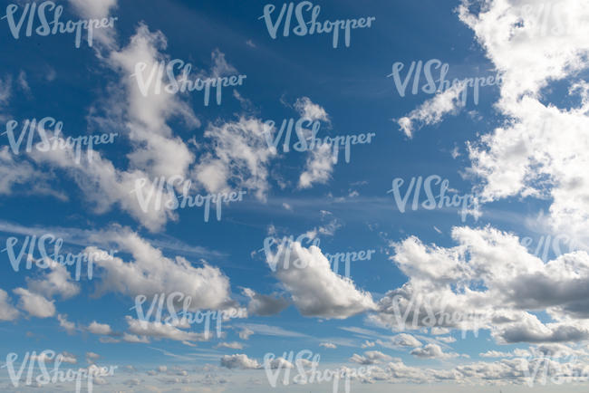 daytime sky with bright white clouds