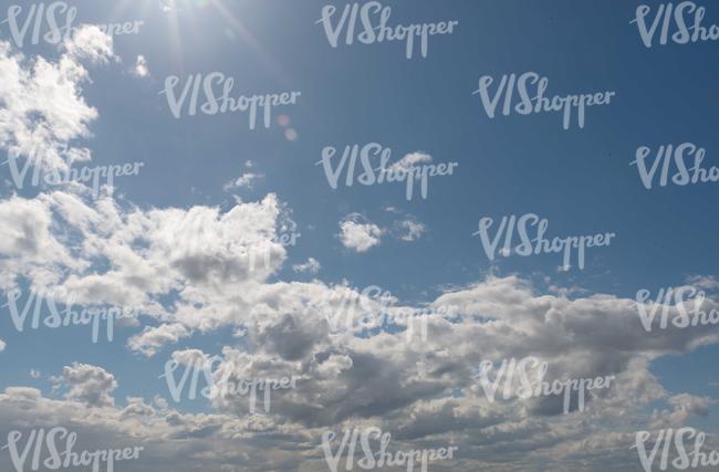 daytime sky with backlit clouds