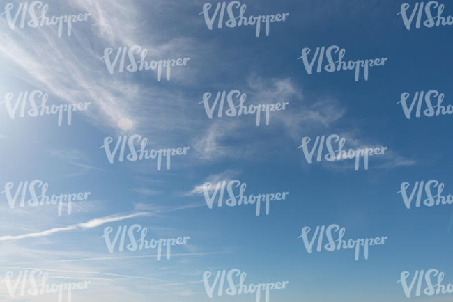 daytime sky with very thin clouds