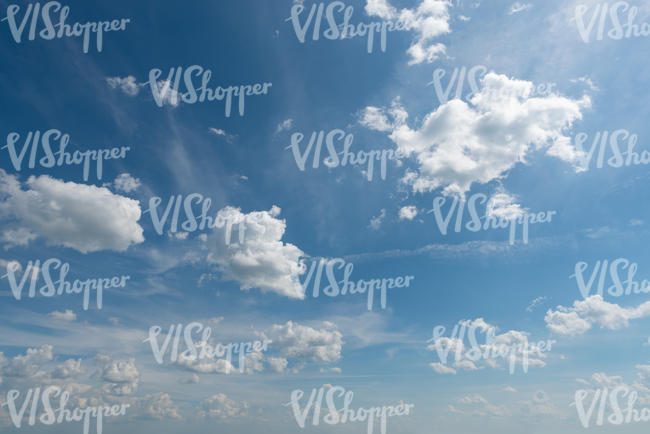 daytime sky with scattered clouds