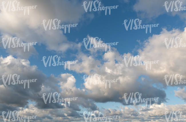 daytime sky with many big clouds