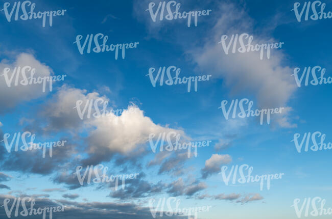 blue sky with fluffy clouds