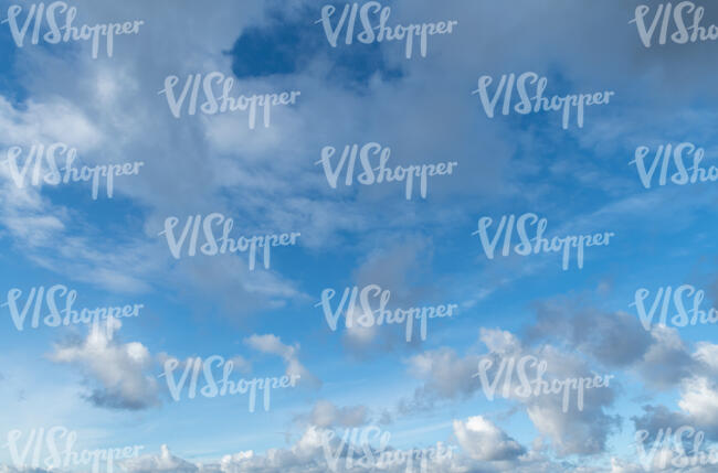 light blue sky with many thin clouds