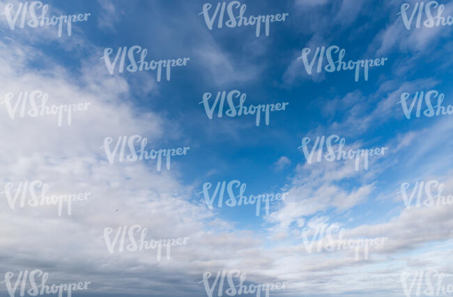 blue sky with large white clouds