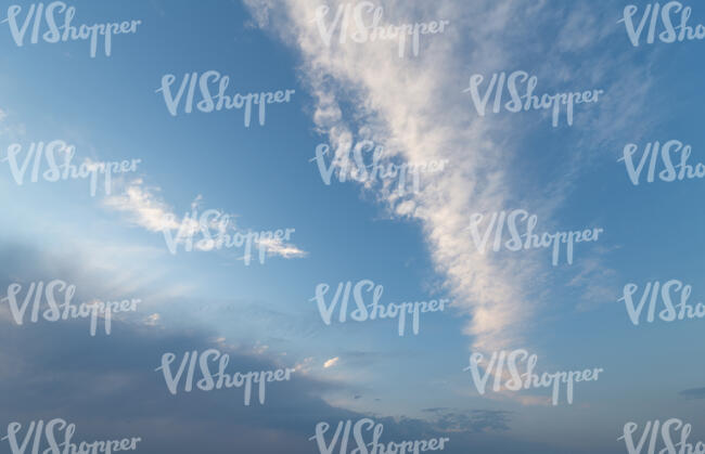 daytime sky with clouds in pastel colors