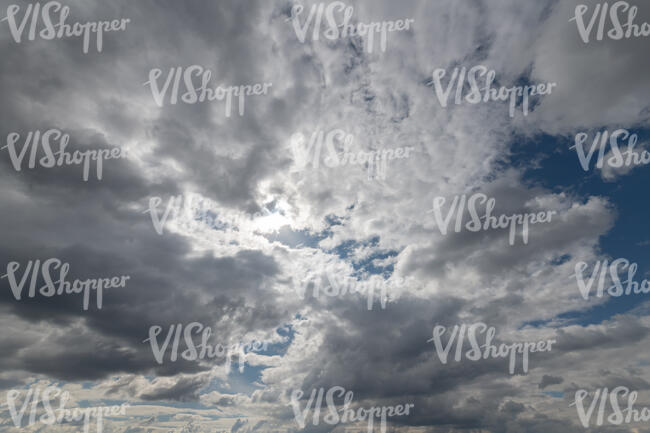 sky with many backlit clouds