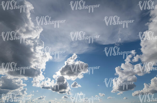 daytime sky with backlit clouds