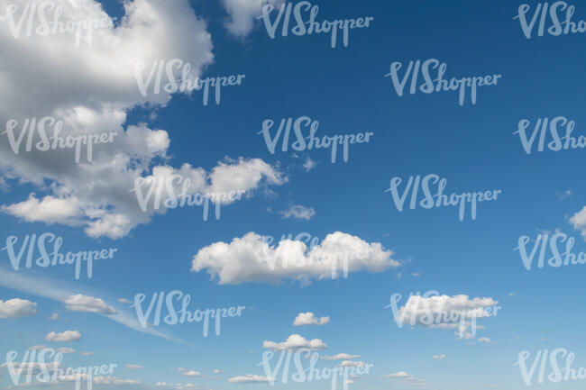 lovely blue sky with small white clouds