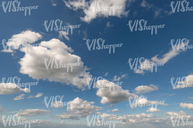 blue sky with white cloud dots