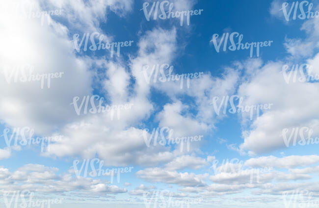 bright blue sky with fluffy white clouds