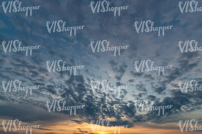 sunset with sun behind the horizon