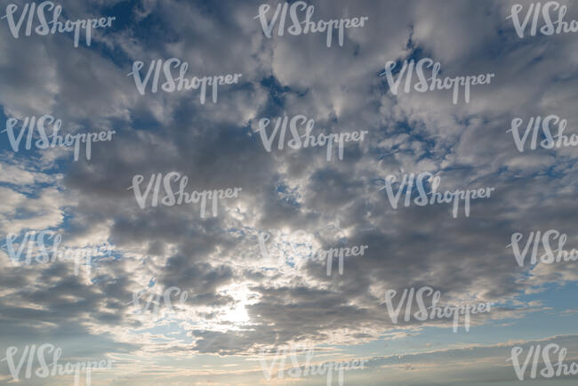 afternoon sky with greyish clouds