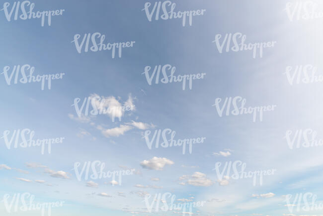 daytime sky covered with thin layer of clouds