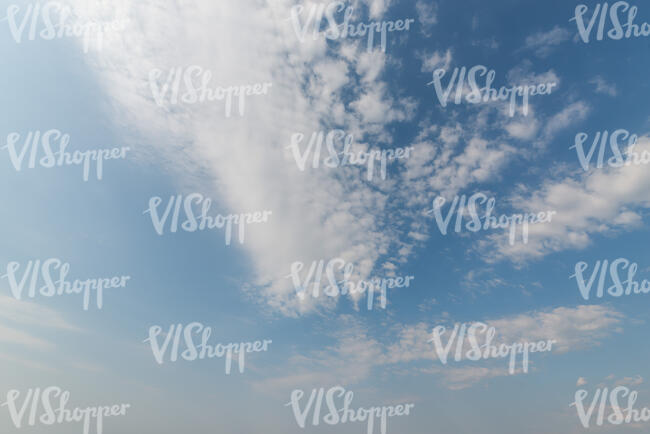 daytime sky with thin white cloud