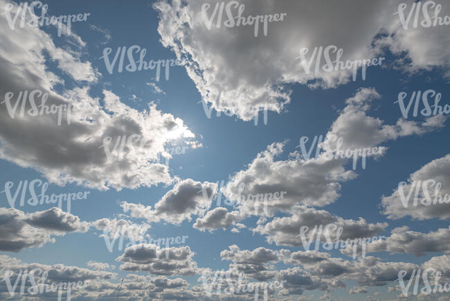 daytime sky with many small white clouds