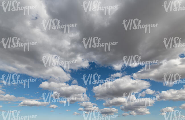 daytime sky partly covered in clouds