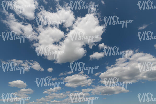 daytime sky with medium white clouds