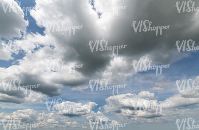 daytime sky with many cumulus clouds