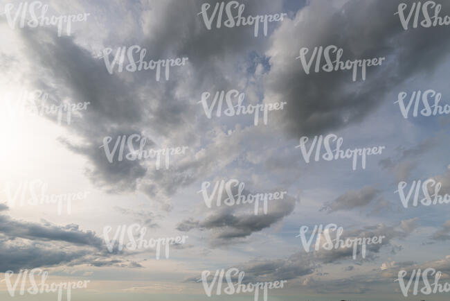 hazy sky with clouds
