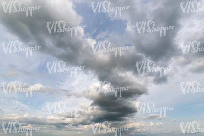 daytime sky with zigzag shaped cloud