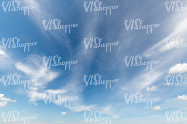 blue sky with thin small clouds