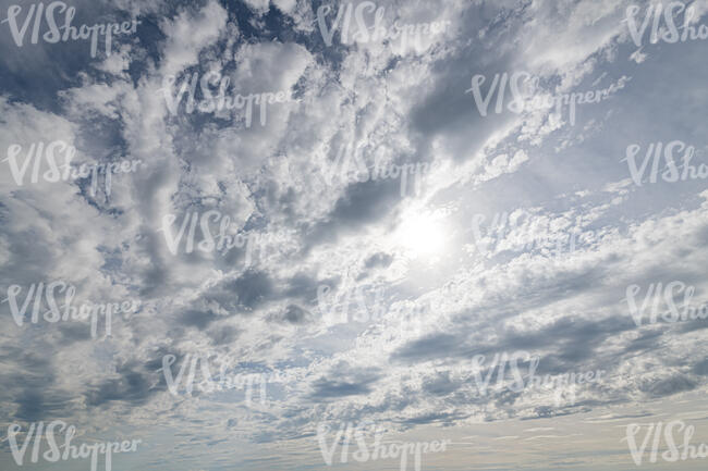 sky with sun and many thin clouds