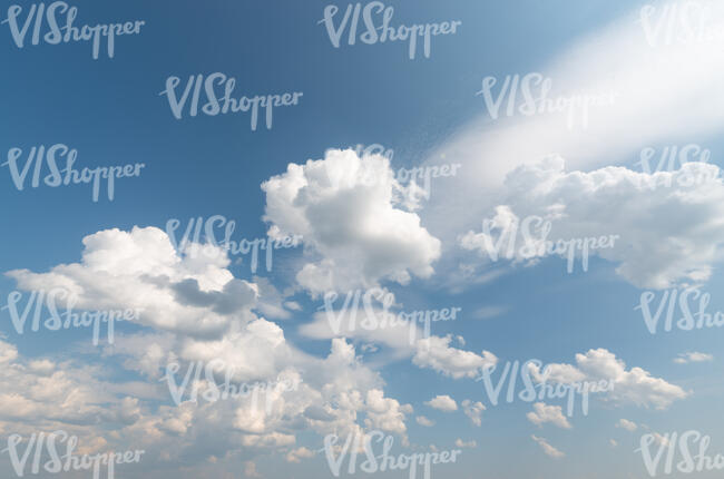 daytime sky with fluffy white clouds