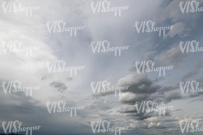 sky covered with thin layer of clouds