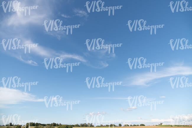 clear daytime sky with few thin clouds