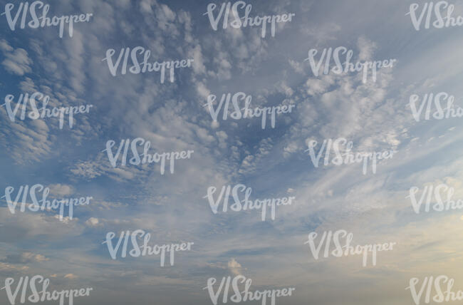 sky partly covered by thin clouds