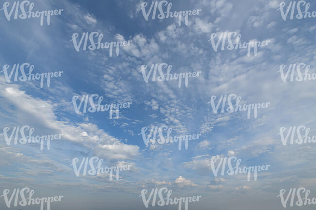 sky partly covered by small clouds