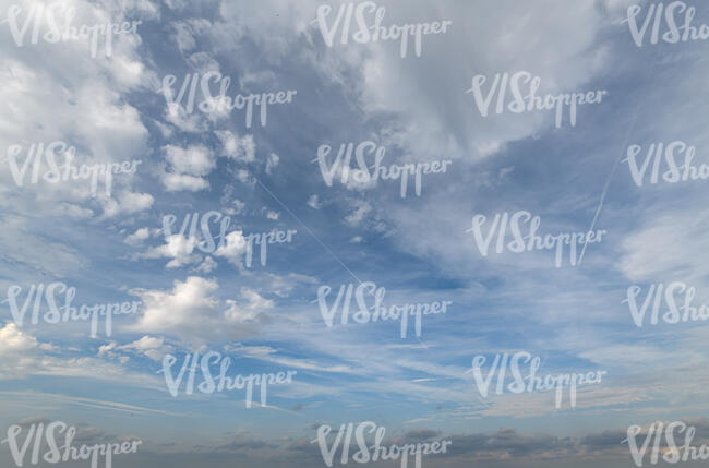 pale blue sky with thin clouds