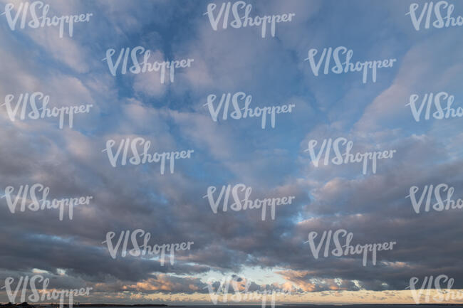 evening sky with deep blue clouds
