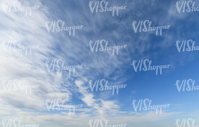 daytime sky with some cirrus and cumulus clouds
