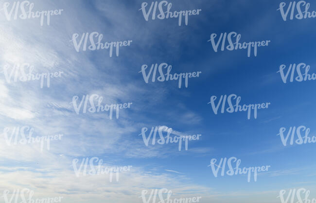 blue daytime sky with light clouds