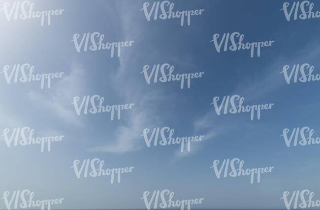 daytime sky with few white clouds
