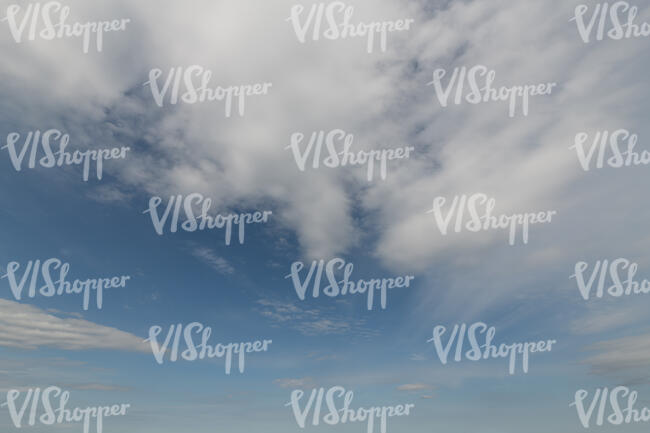 daytime sky with a fluffy white cloud