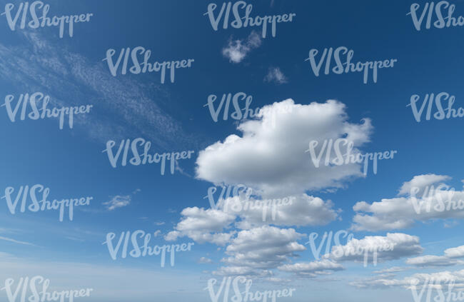blue sky with white cumulus clouds
