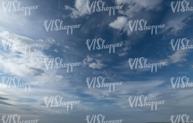 daytime sky with thin clouds