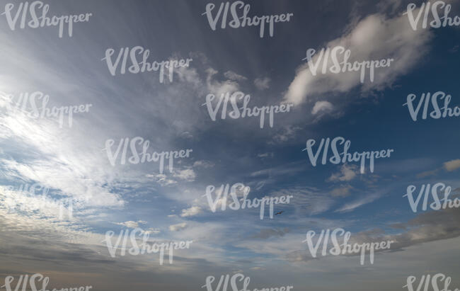 somewhat cloudy daytime sky