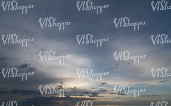 late evening sky with thin layer of clouds