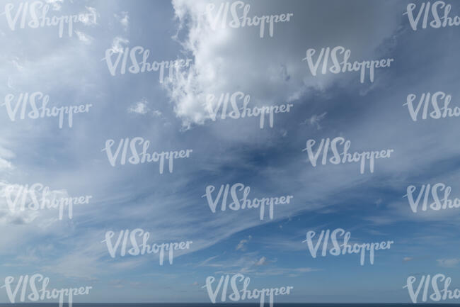 daytime sky thinly covered with white clouds