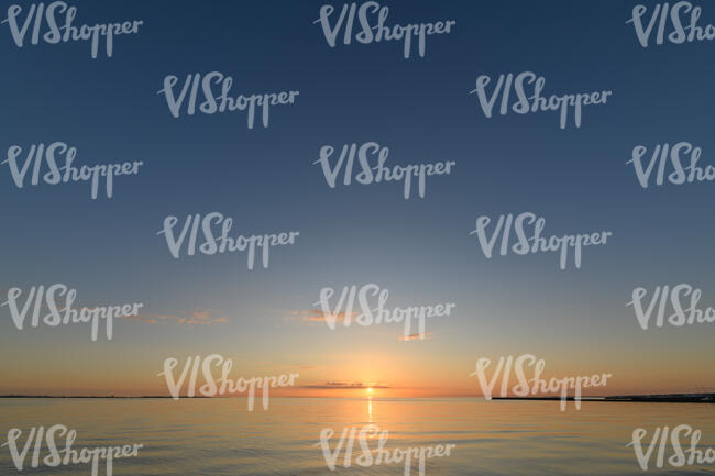 sunset with sun barely above the horizon