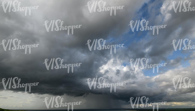 sky with rain cloud in the corner