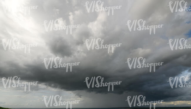 grey sky with a rain cloud
