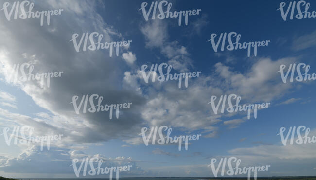 sky view with some large cumulus clouds