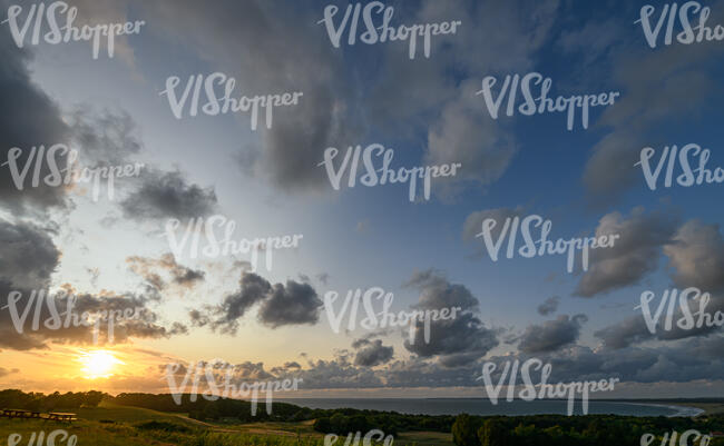 sunset with sun visible above the horizon